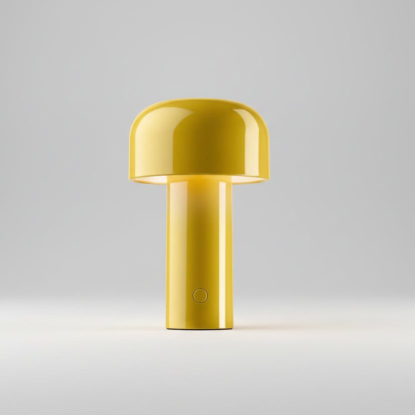 Lampe à poser design en polycarbonate jaune brillant, style champignon avec éclairage LED intégré, luminaire contemporain coloré pour chambre d'enfant ou bureau moderne.